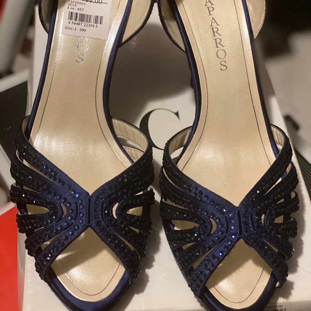 New Caparros Navy Blue heels! Style at your next!